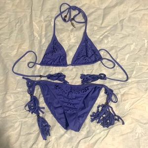 purple bikini; soft (waterproof) fabric; unique details on straps